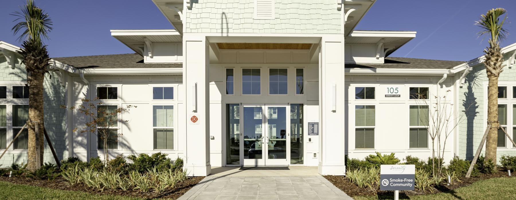 a white building with a walkway